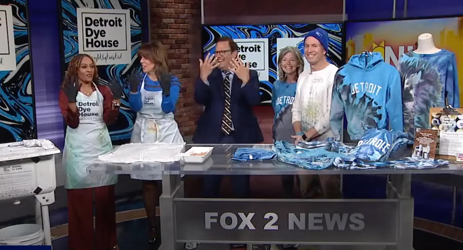 FOX 2 News segment on Detroit-themed apparel at the Dye Hard Lions event.