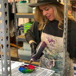 Artist in dye class at Detroit dye house working with vibrant materials in Corktown