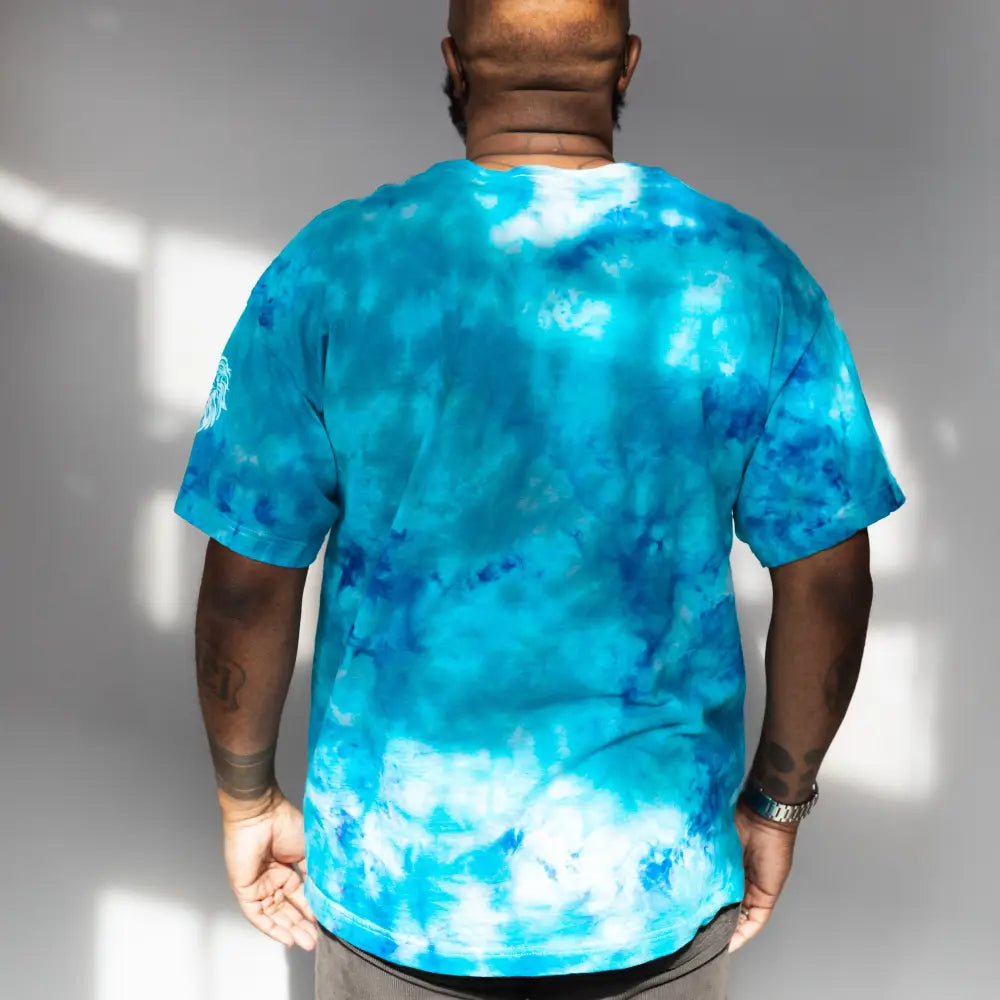 Tie-dyed Detroit Lions Unfinished Business Shirt in vibrant blue and white patterns