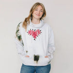White hoodie with pink floral heart and tie dye accents from Valentines Specialty Class