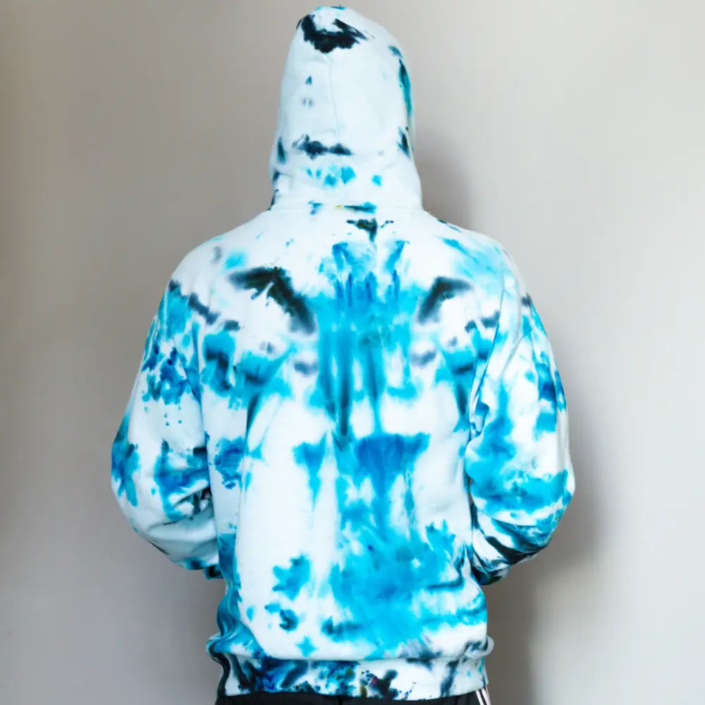 Tie-dyed white and blue DDH Hoodie showcasing recommend sizing in stylish clothing