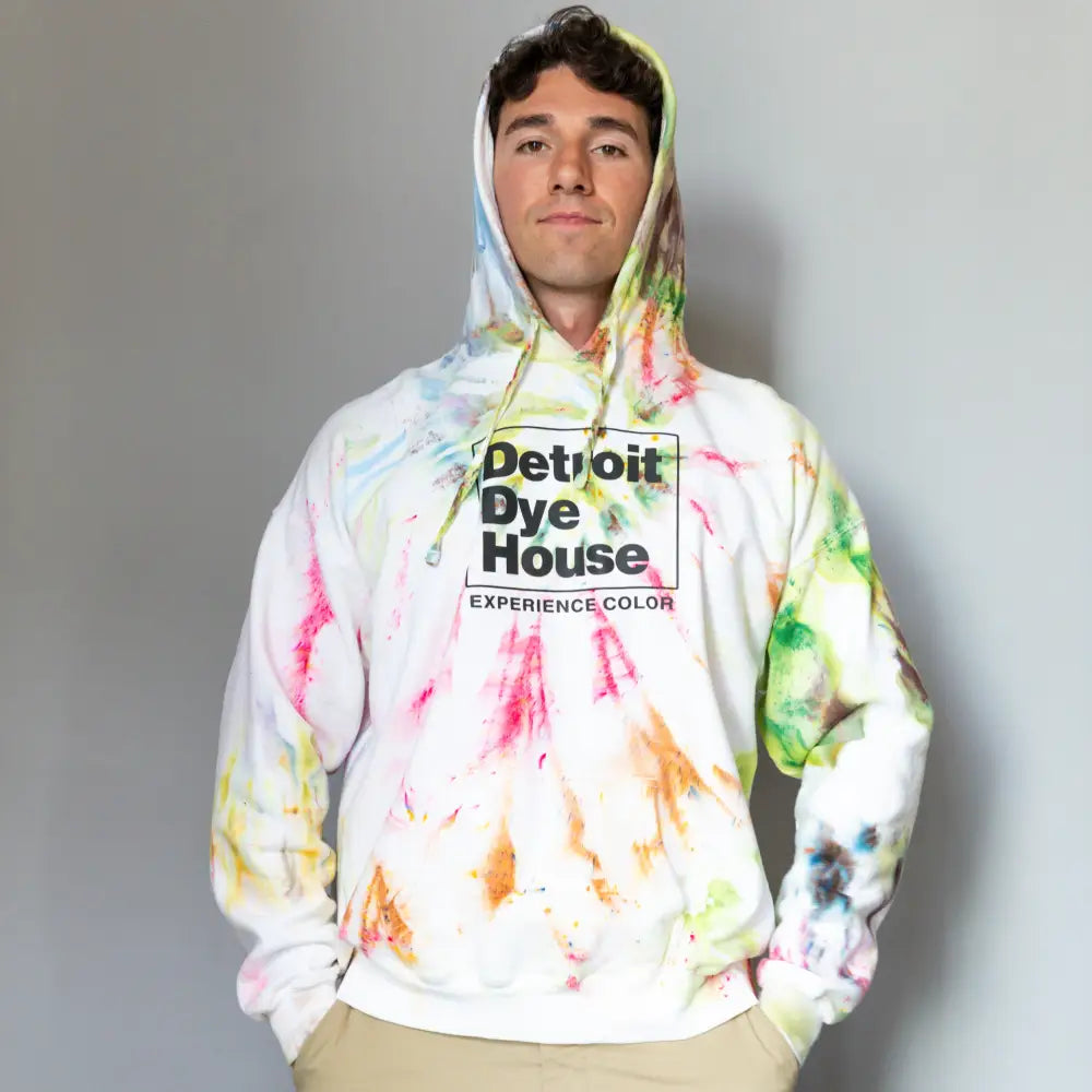 Tie-dyed white hoodie sweatshirt with Detroit Dye House text, recommend sizing available