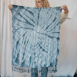 Blue and white tie dye scarf with tasseled fringe, perfect for stylish clothing