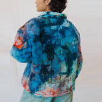 Tie-dyed Angie Jacket in blue, coral, and white with swirling patterns