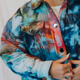 Vibrant Tie-dyed Angie Jacket in swirls of blue, orange, and turquoise colors