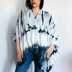 White and navy blue tie dye kimono-style wrap top with flowing sleeves for stylish clothing