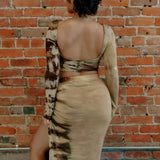 Back view of Cait set fitted tie-dye dress with high slit in beige and brown tones