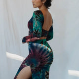 Tie-dye bodycon dress with long sleeves, high slit in teal, burgundy, and black