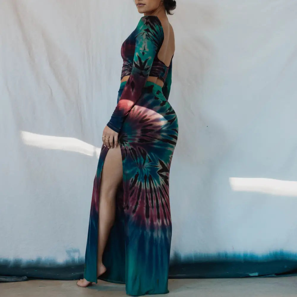 Long tie-dye dress with high slit in teal, purple, and burgundy from Cait set