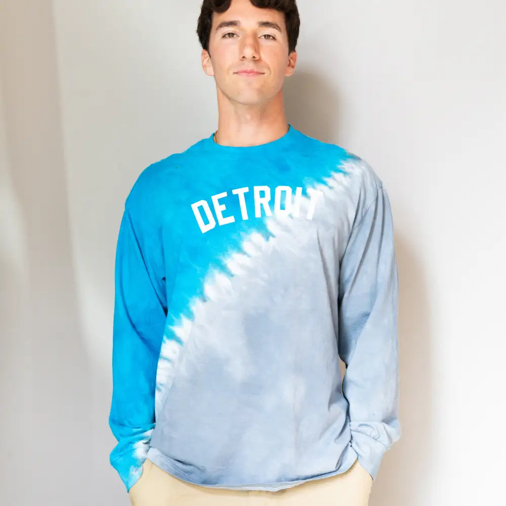 Blue and white tie dye long sleeve sweatshirt featuring DETROIT text across the chest