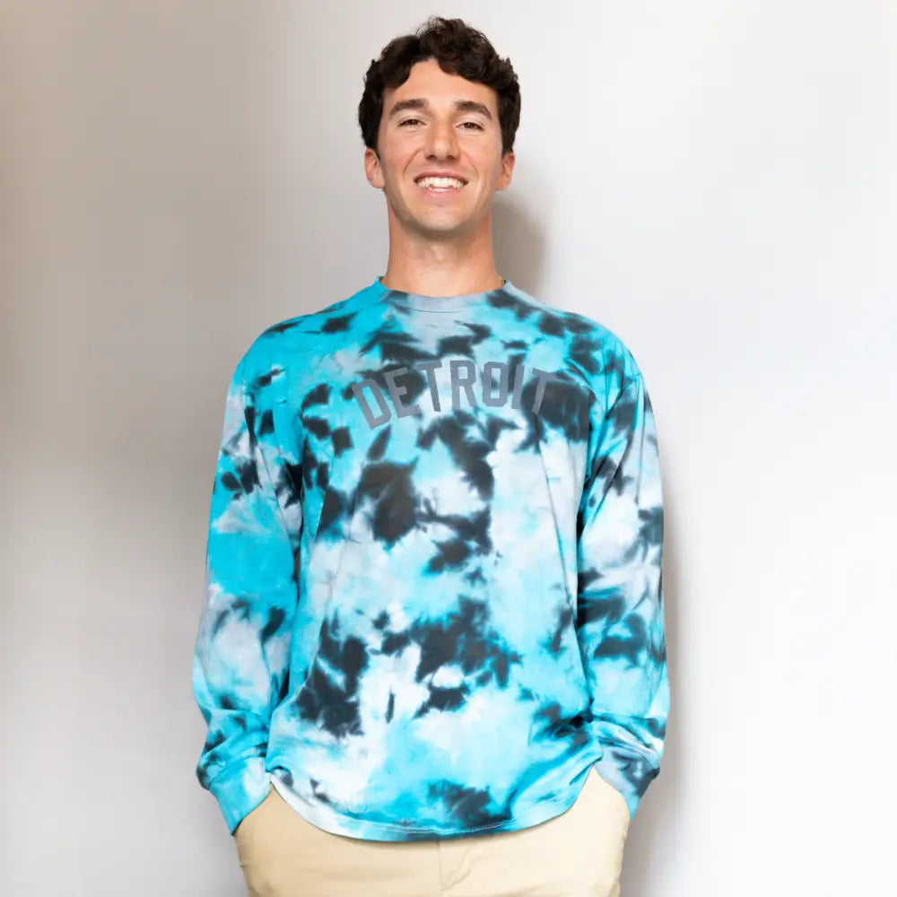 Bright turquoise and black tie dye long sleeve sweatshirt for stylish clothing