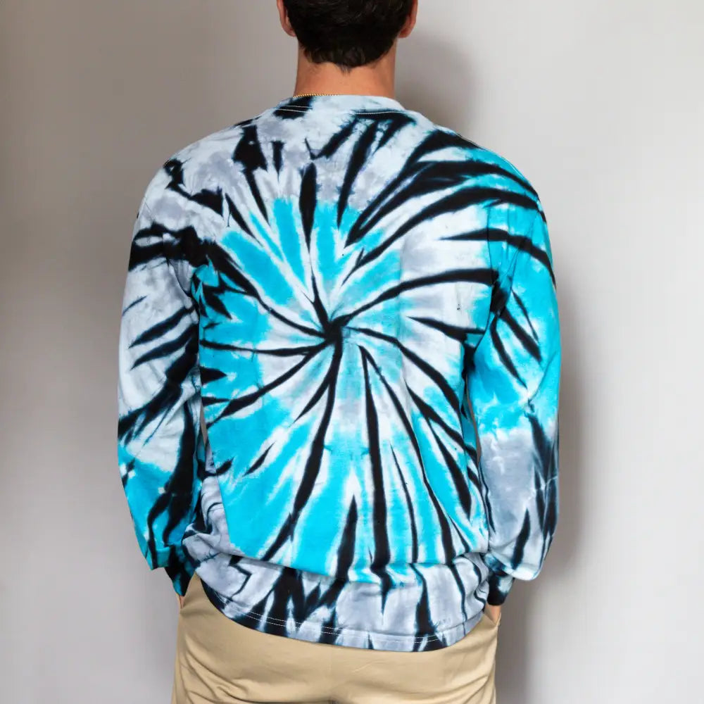 Tie dye long sleeve sweatshirt in turquoise, black, and white swirling patterns