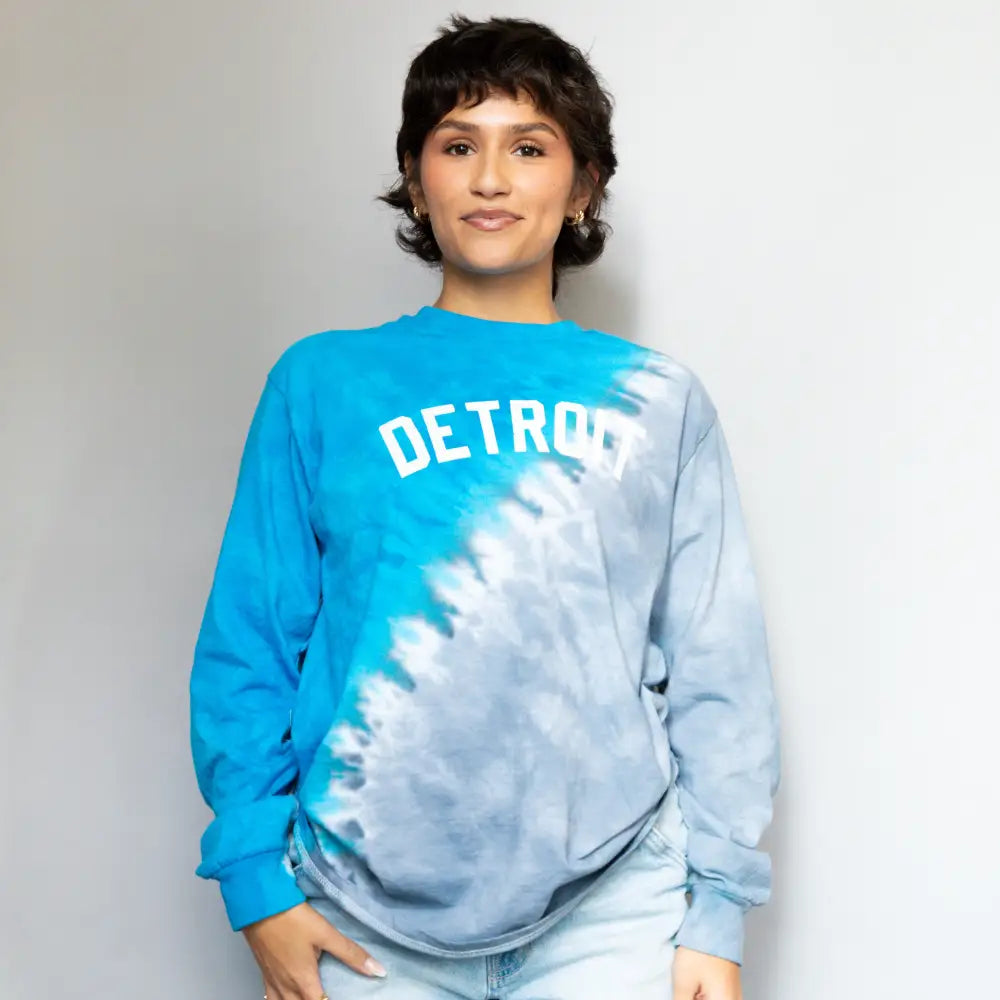 Blue and white tie-dye long sleeve sweatshirt with DETROIT text across the chest