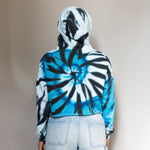 Blue, black, and white spiral tie dye crop hoodie for trendy clothing styles