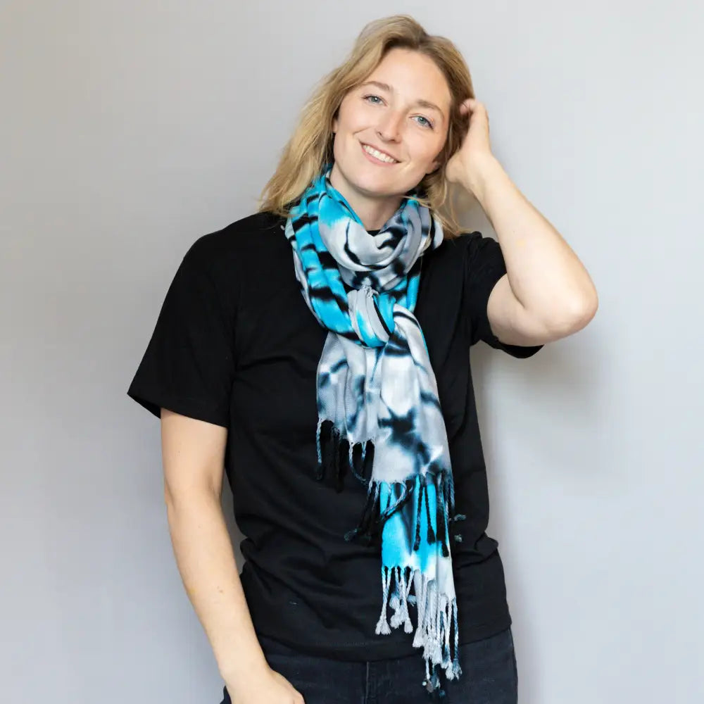 Blue and white tie dye scarf paired with a black t-shirt from Lions Bundle clothing