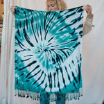 Turquoise and black tie dye scarf with tasseled fringe for stylish clothing accents