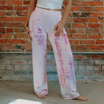 Pink and white tie-dyed sweatpants showcasing the Perfect Pant relaxed fit design