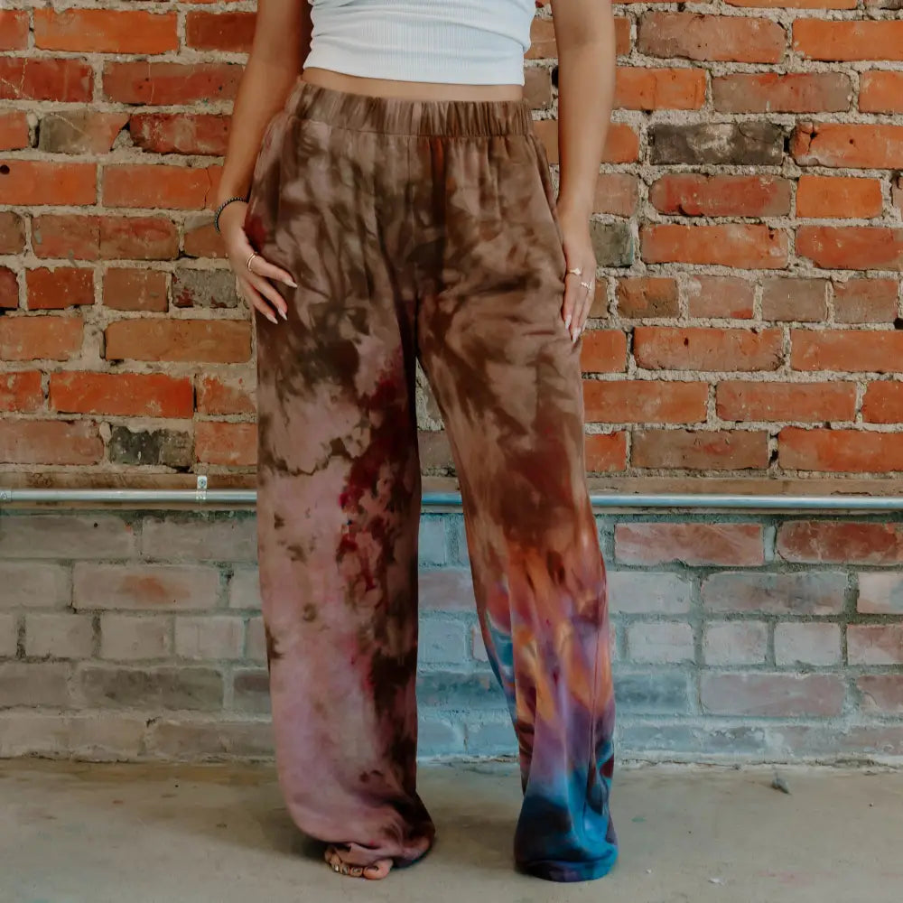 Tie-dyed cotton lounge pants in brown, pink, and blue patterns for the Perfect Pant