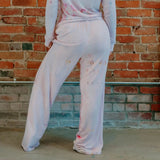 Pink tie-dyed sweatpants with a relaxed wide-leg fit from the Perfect Pant collection