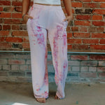 White Perfect Pant sweatpants with pink tie-dye pattern and pockets for casual wear