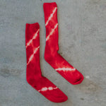 Red tie-dyed socks with white stripes made from bamboo rayon clothing