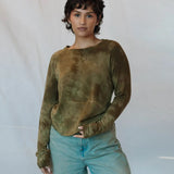 Olive green tie-dyed Soft Serena Top with light blue jeans for a stylish look