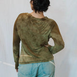 Olive green tie-dyed sweatshirt paired with light blue jeans, featuring Soft Serena style