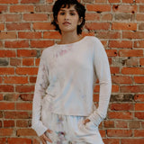 White tie-dyed loungewear set featuring long sleeves and matching pants from Soft Serena