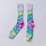 Vibrant tie dye bamboo rayon socks featuring swirls of pink, blue, yellow, and purple