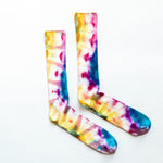 Bamboo rayon tie-dye socks featuring yellow, pink, and blue swirling patterns