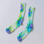 Tie dye bamboo rayon socks in blue, green, yellow, and purple swirls