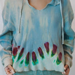 Light blue tie-dyed waffle knit Sophie pullover with floral border designs