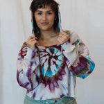 Sophie pullover featuring tie-dyed waffle knit in purple, blue, and burgundy spiral pattern