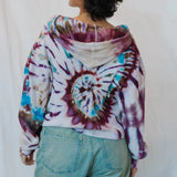 Sophie Pullover tie-dyed hoodie in purple, blue, and white spiral pattern, waffle knit