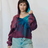 Sophie Pullover in tie-dyed purple and turquoise, styled with light denim jeans