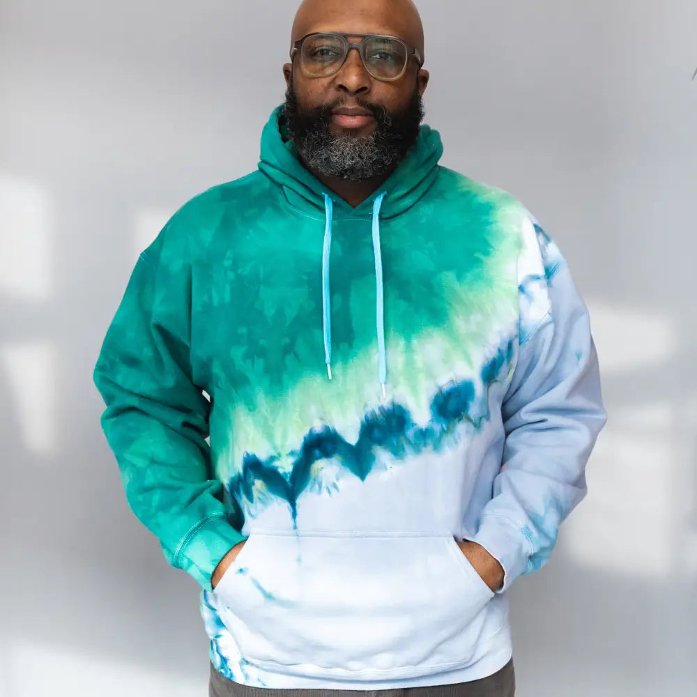 Tie-dyed hoodie sweatshirt in turquoise, navy, and white for Michigan State clothing