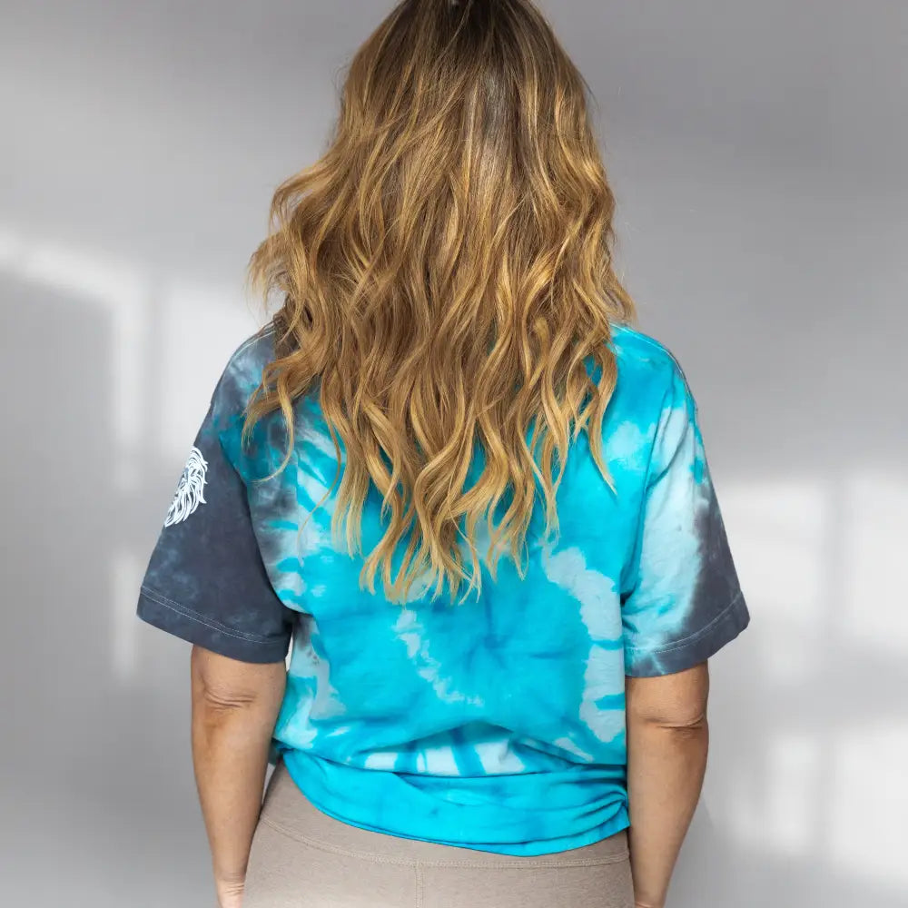 Tie-dyed turquoise and gray Detroit Lions Unfinished Business Shirt with wavy blonde hair