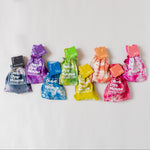 A rainbow of color socks inside their matching bags.