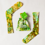 Color socks in varying greens with a matching bag.