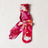 Color socks in varying shades of red.