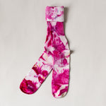 Color socks in varying pinks.