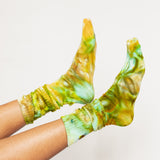 Color socks in varying greens.