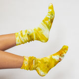 Color socks in varying yellows.