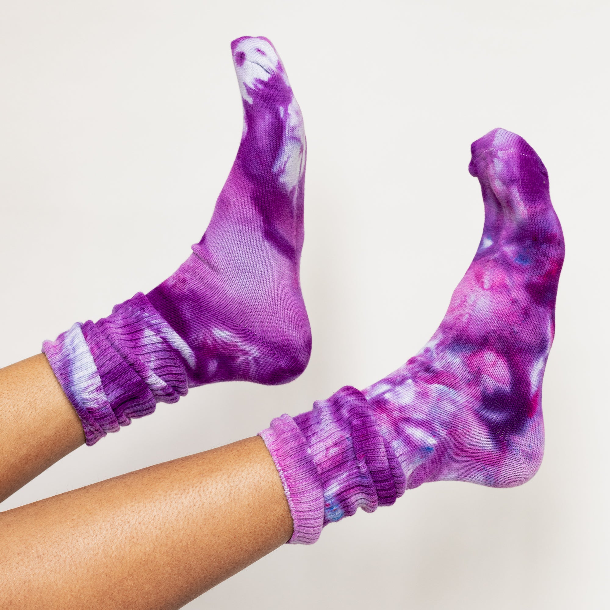 Color socks in varying purples.